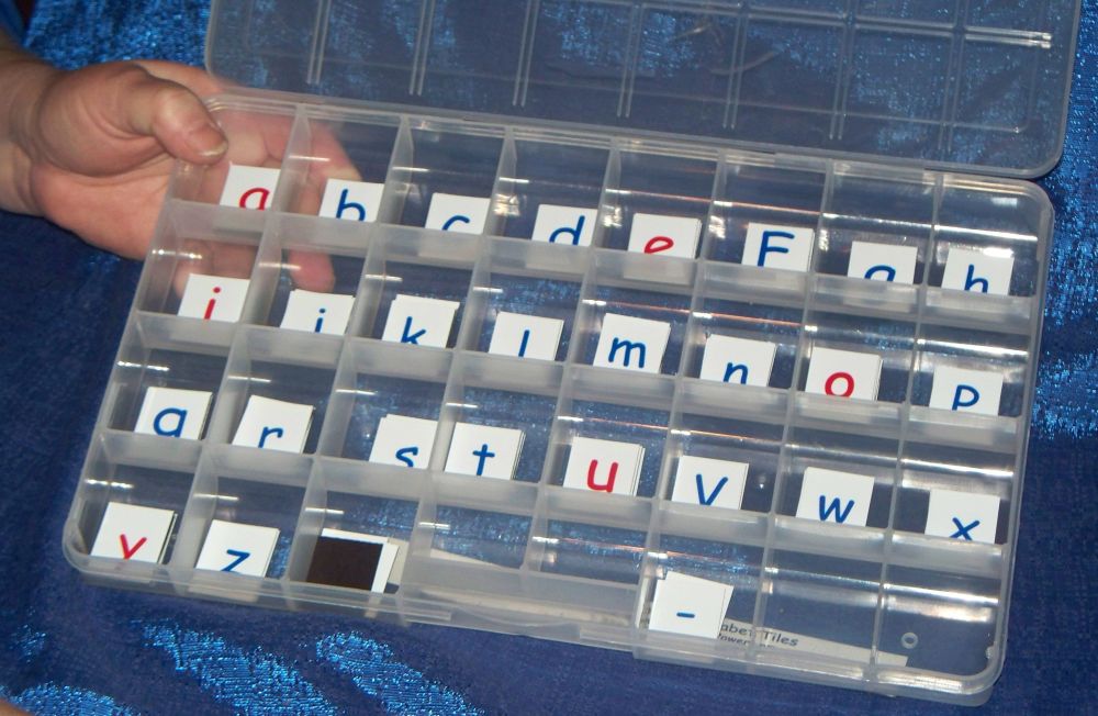 Spelling Power Magnetic Tiles come in a handy no-spill storage box